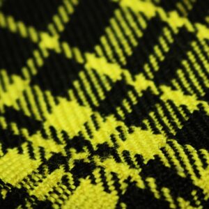 Tejido pepita en amarillo y negro para fundas de coche a medida